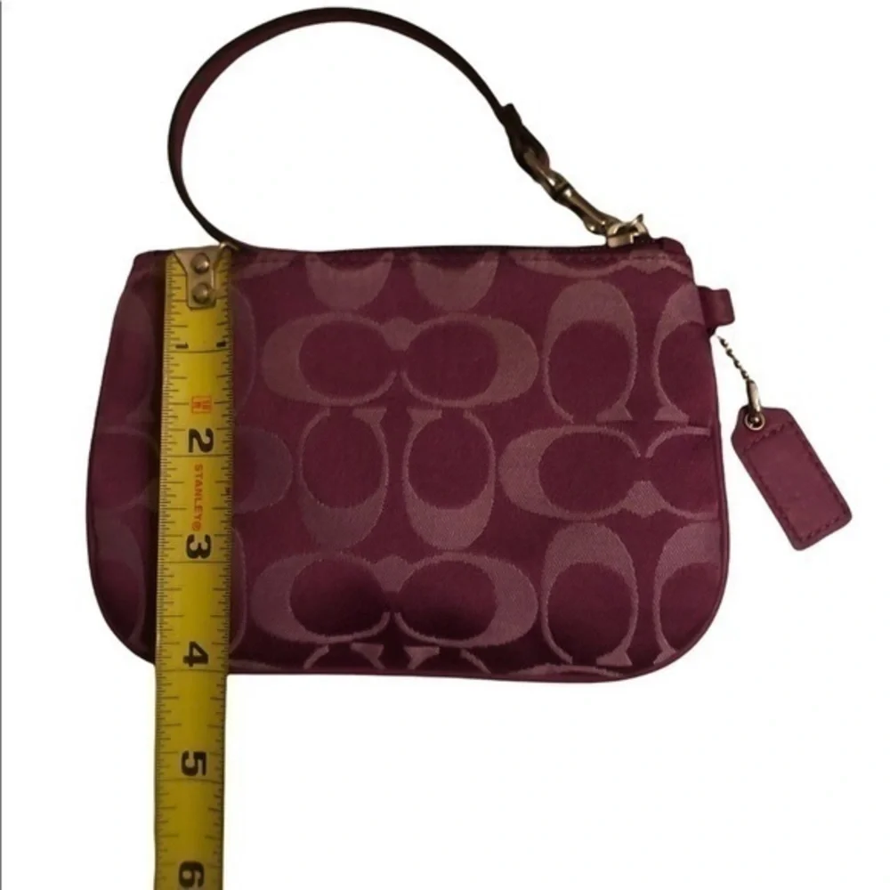 Coach purple signature c wristlet bag